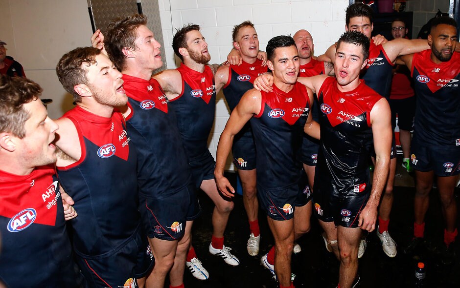 AFL 2015 Rd 12 - Geelong v Melbourne GEELONG, AUSTRALIA - JUNE 21: Billy Stretch (left) and Alex Neal-Bullen of the Demons sing the team song after the 2015 AFL round twelve match between the Geelong Cats and the Melbourne Demons at Simonds Stadium, Geelong on June 21, 2015. (Photo by Michael Willson/AFL Media)